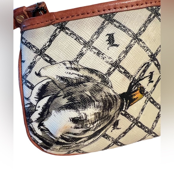 L.A.M.B. Preowned Gwen Stefani Wristlet Wallet
Marigold Floral Graphic  (P069) - Picture 6 of 9